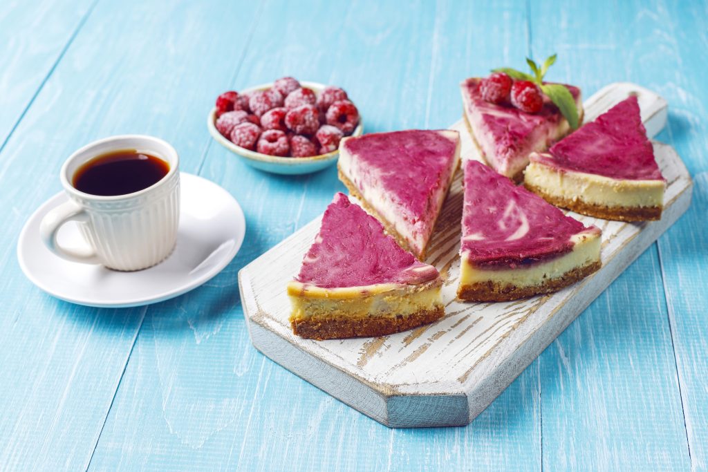 Homemade raspberry cheesecake with honey.